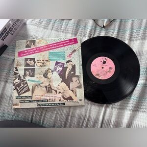 Vintage Vinyl Record with Retro Cover Art
